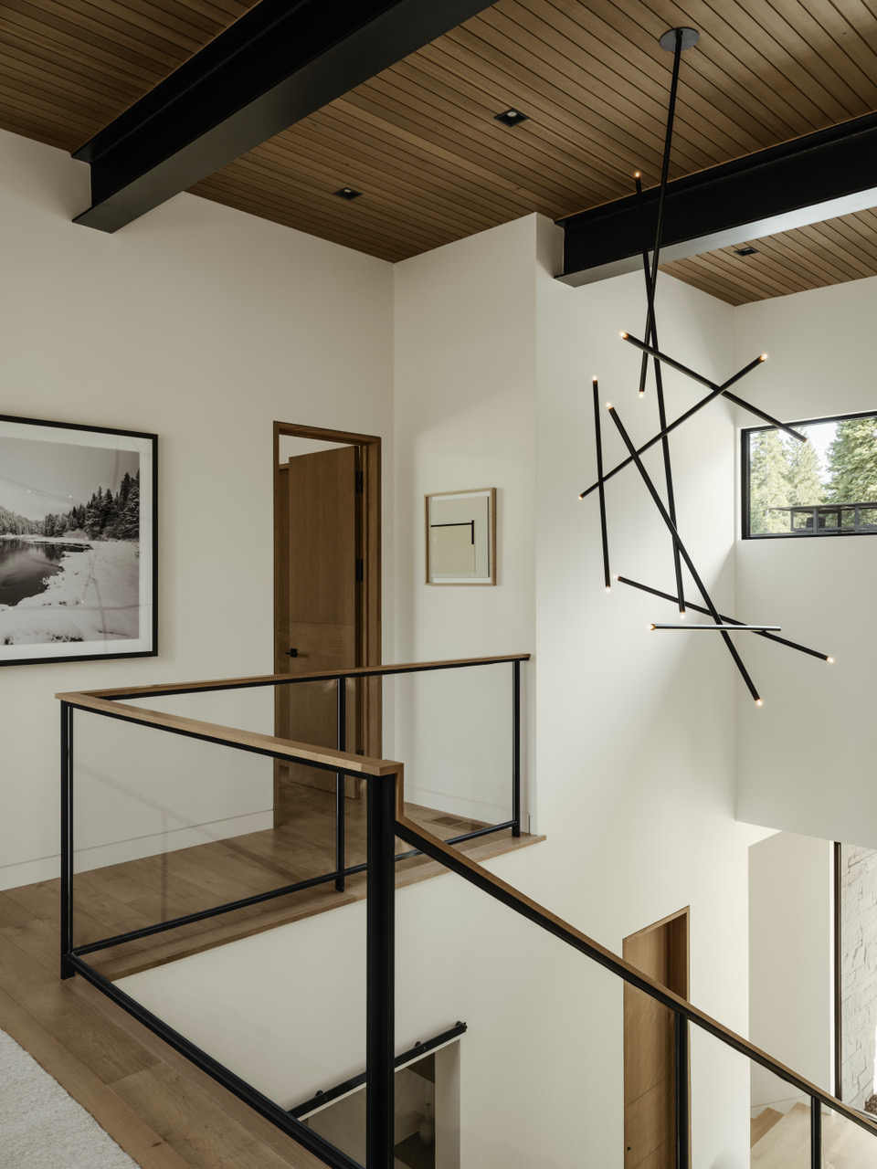 ROOM Furniture and Lighting Cam Crockford Custom Stick Chandelier Stairwell